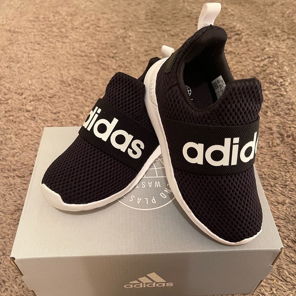 Black and white Adidas size 9 Toddler. Still in ordinal box. Worn once.